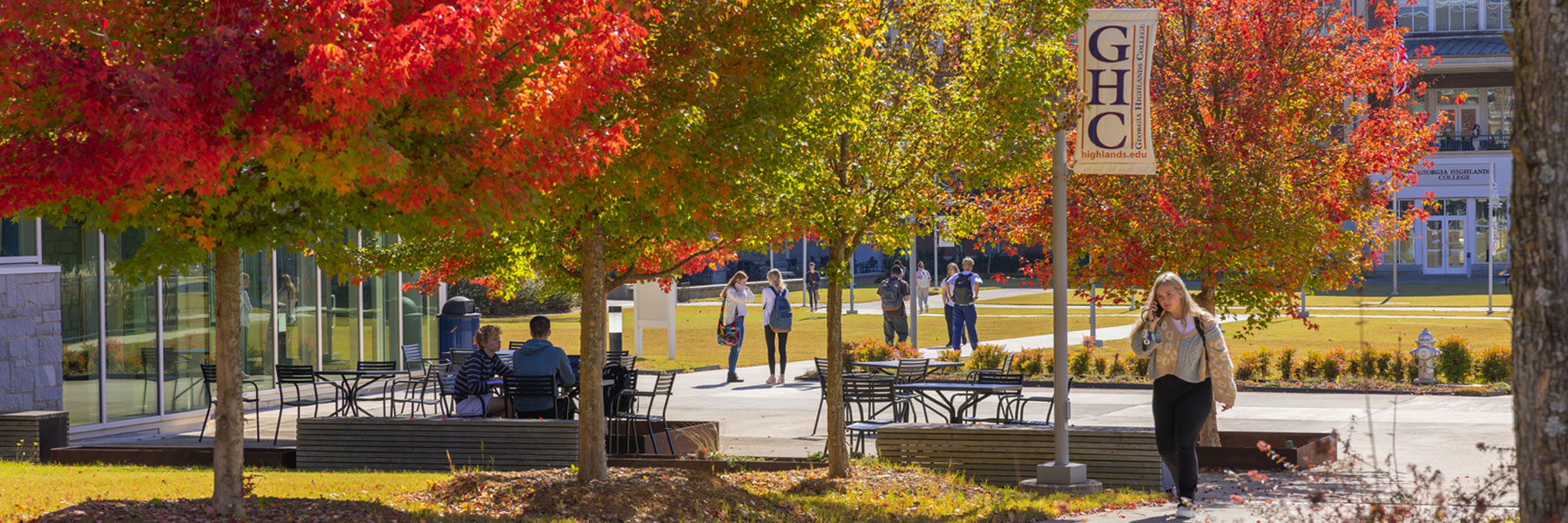 Cartersville campus in fall with colorful leaves. Students walking to classes.